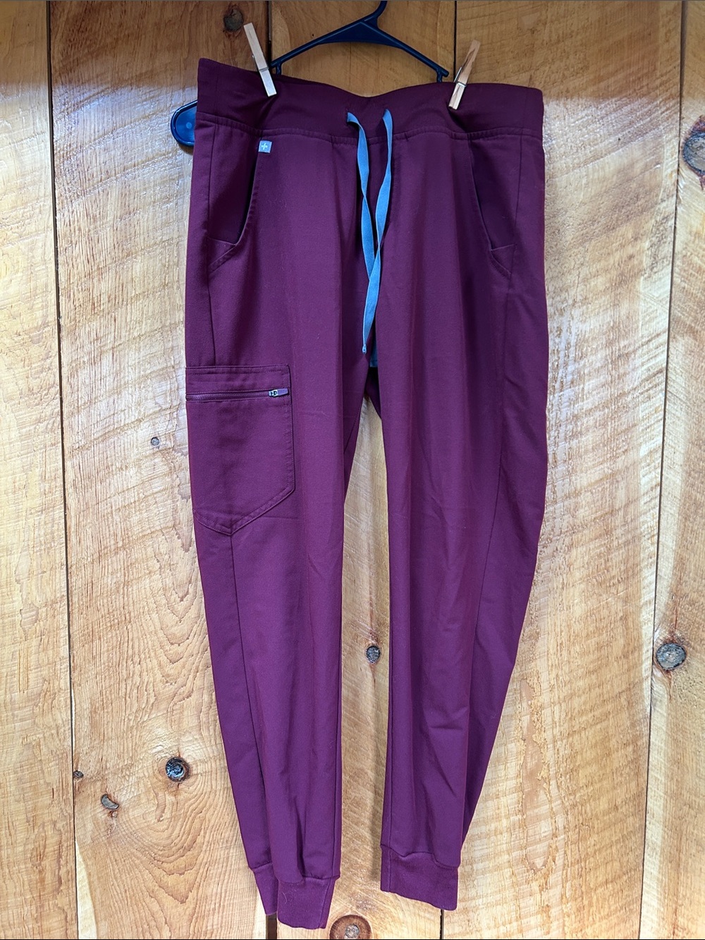 Figs Women Burgundy Scrub bottoms with Blue Drawstring.